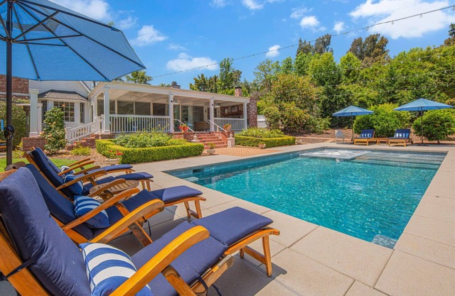Heaven on Earth with two houses and two pools!