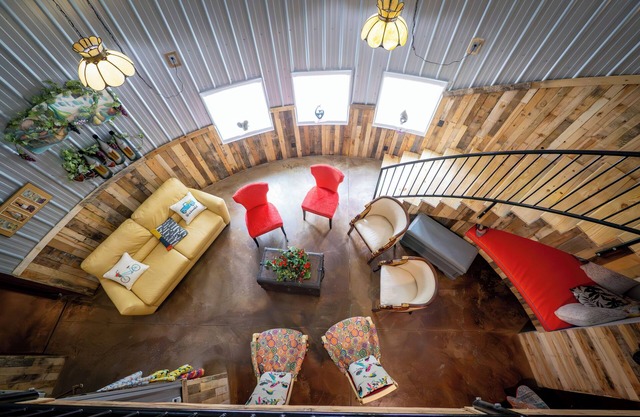 Hermann Grain Bins BNB and Retreat Center Guest Grain Bin Foghorn Leghorn is a 2 story 30 plus foot grain bin with two distinct levels. Main level contains two queen beds, living room and full bathroom. Balcony Level contains queen bunk bed and ful