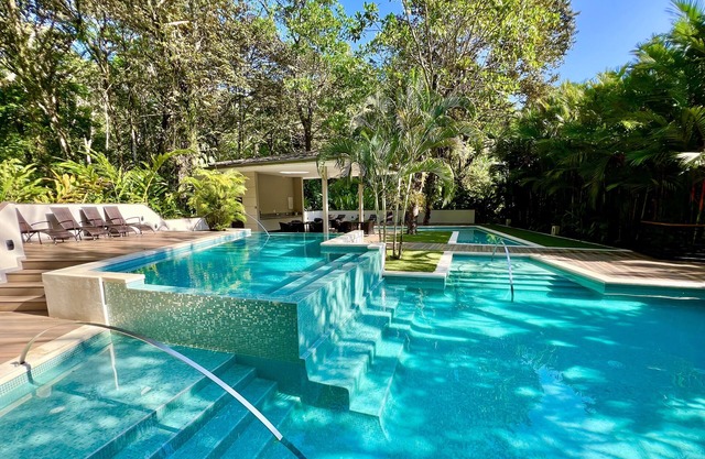 High End Gated Condo, Walk to Exclusive Beach