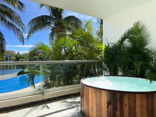High-End Waterfront Condo at Secrets Waters