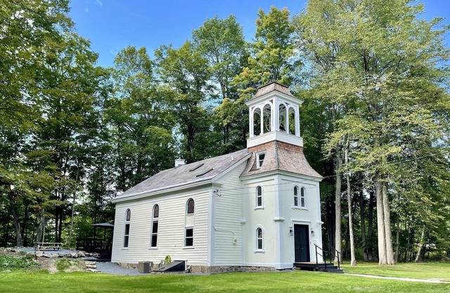 Historic 1867 Church nestled in the woods near Lake George