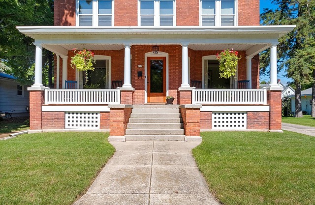 Historic 2-bedroom 1st floor unit with a beautiful porch in delightful De Pere