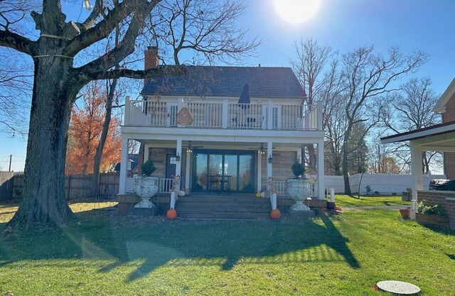 Historic Log Cabin fully restored; gourmet kitchen & much more!