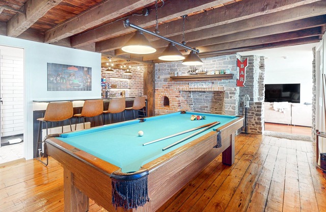 Historic riverfront home near downtown with private hot tub, river views, & dock