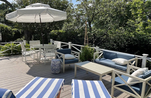 Historic seaside home with large deck , yard & two car garage