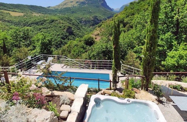 Historic villa tower with swimming pool in the Sibillini Mountains