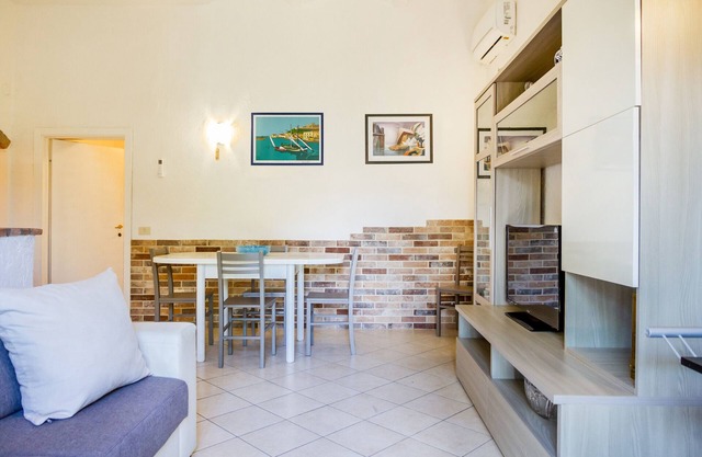 Ferienhaus "Palmiro" mit Gemeinschaftsgarten und WLAN