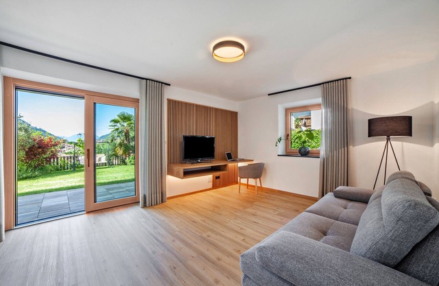 Holiday Apartment Berta – new, comfortable, with garden terrace & mountain view