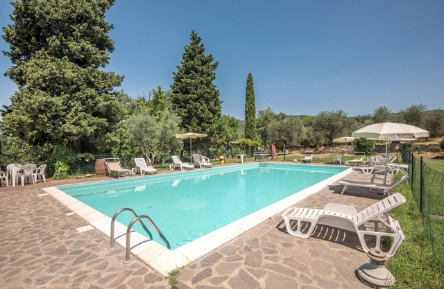 Ferienwohnung 'Bilocale Brando' mit Pool, Garten und WLAN