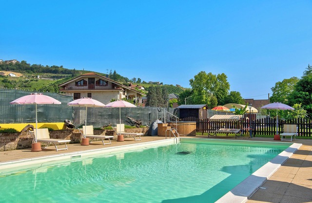 Ferienwohnung 'Magnolia' in Piemont, mit Gemeinschaftspool, Garten und Sauna