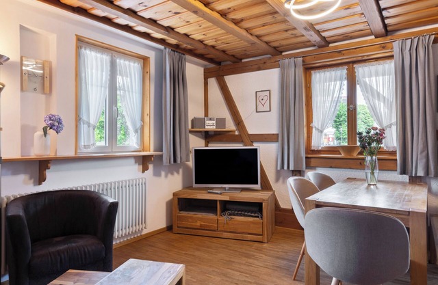 Ferienwohnung "Schwalbennest" mit Gemeinschaftsgarten, Balkon und Wi-Fi
