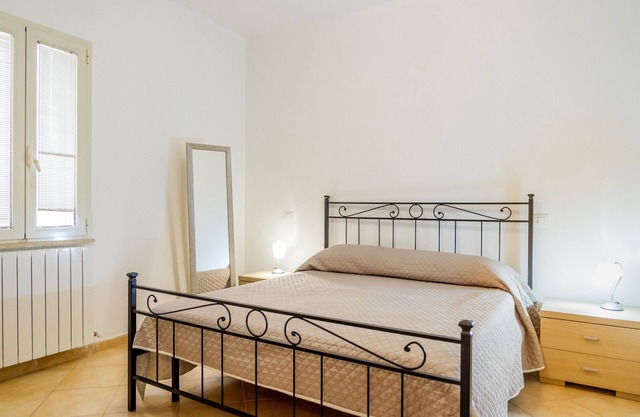 Ferienwohnung "Acqua" mit Meerblick und Privatem Garten