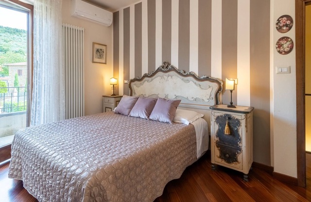 Holiday Apartment "Casa Le Rose" with Mountain View, Private Terrace & Wi-Fi