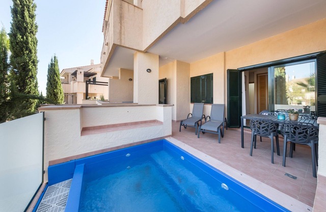 Ferienwohnung "El Oasis Malasia 16 Bajo A" mit Gemeinschaftspool, privater Terrasse und WLAN