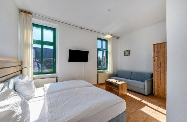 Ferienwohnung 'Fewo E5' mit Gemeinschaftsgarten und WLAN