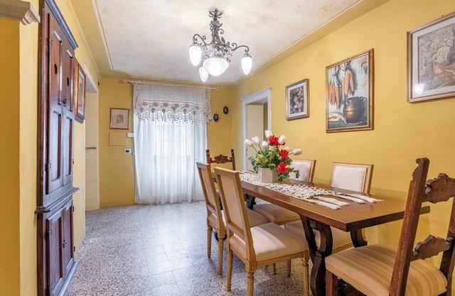 Ferienwohnung "Grillo Rosso 8" mit privatem Garten und Kamin
