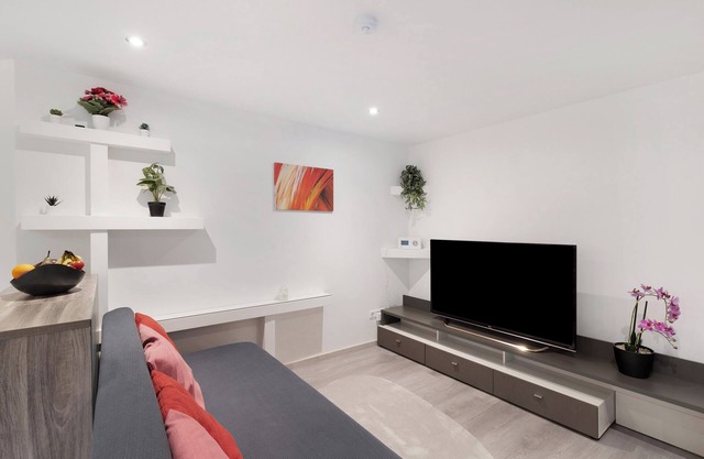 Ferienwohnung 'Hochwertige Ferienwohnung Ötigheim' mit Gemeinschaftsgarten, WLAN und Klimaanlage