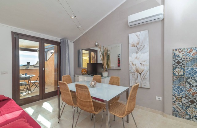 Ferienwohnung "C 306 Attico Puntavilla Mare" mit Meerblick