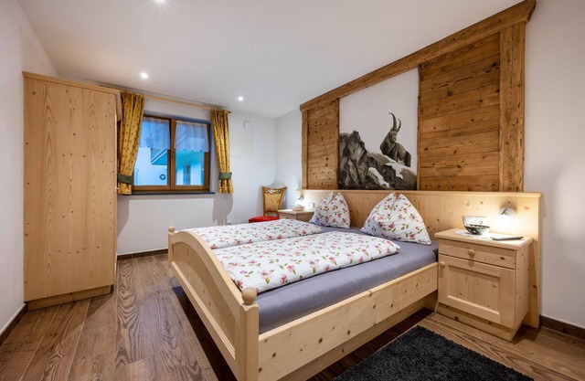 Ferienwohnung "Dreiherrenspitze" mit gemeinschaftlich genutztem Whirlpool & Garten