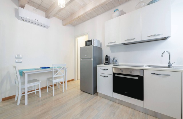 Holiday Apartment "La Perla con Balcone" with Private Balcony, A/C & Wi-Fi
