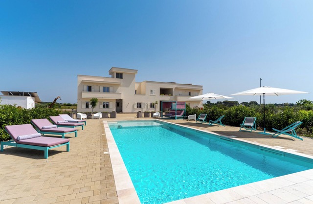 Ferienwohnung "Le Scuderie 5" mit Gemeinschaftspool, gemeinsamer Terrasse und WLAN