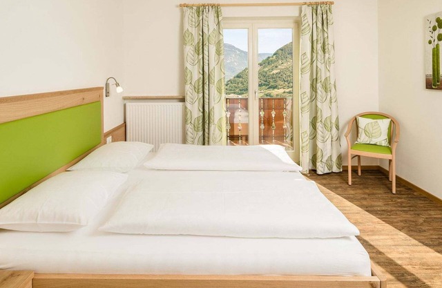 Ferienwohnung 'Rasnerhof Ferienwohnung Meran' mit Bergblick, Balkon & WLAN