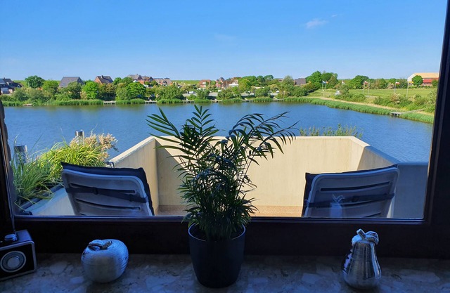 Holiday Apartment 'Watt'n Utsicht' with Sea View, Balcony and Wi-Fi