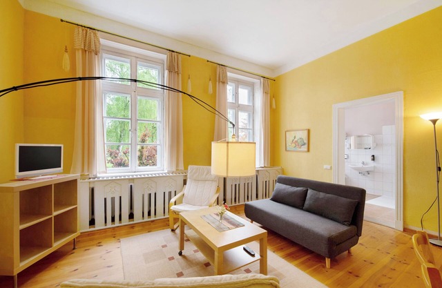 Fewo 'Ferienwohnung 1 - Barrierefrei' mit Gemeinschaftsterrasse, Gemeinschaftsgarten