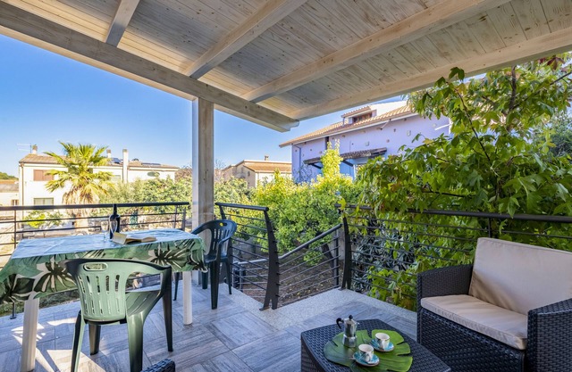 Ferienhaus Appartamento LaTorre mit Balkon, Terrasse und Gemeinschaftsgarten