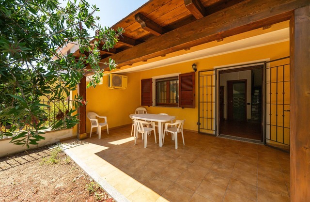 Ferienhaus 'Casa Giuliana' mit Gemeinschaftsterrasse, privatem Garten und Klimaanlage