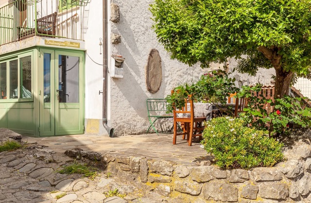 Ferienhaus Destinazione Paradiso mit Bergblick und Garten