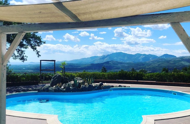 Holiday Home 'Hill House La Roccia' with Sea View, Shared Pool & Shared Garden