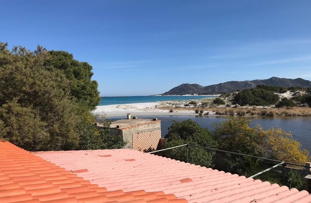 Holiday Home 'On The Sea Fenicottero' with Sea View, Private Terrace and Private Garden