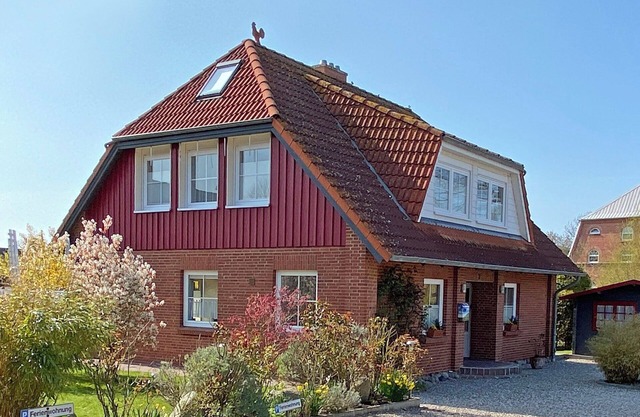 Ferienhaus 'Kleiner Leuchtturm-Backbord' mit privater Terrasse, privatem Garten und Wi-Fi