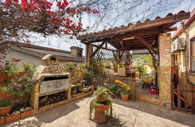Ferienhaus 'Monolocale Il Girasole' in Stadtzentrumnähe mit Garten und Klimaanlage