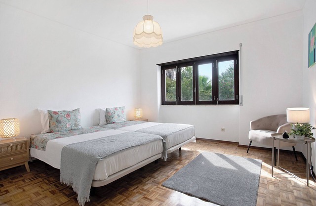 Ferienhaus 'Praia Do Sul' mit Meerblick, privatem Garten und WLAN