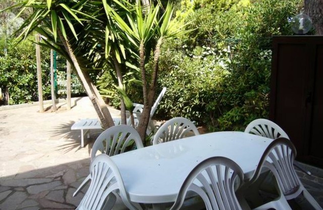 Holiday Home 'Residence Giannella - Robinia 35' with Private Garden and Air Conditioning