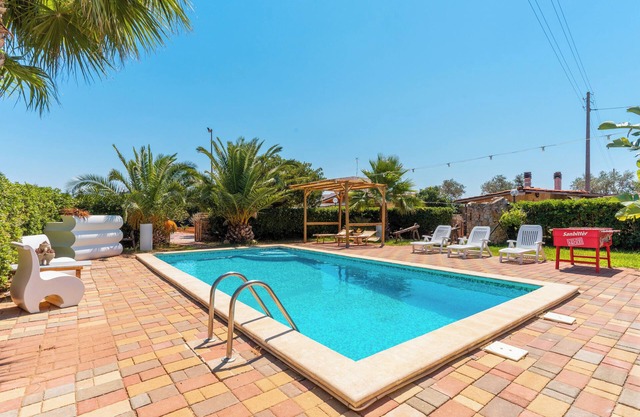 Ferienhaus 'Villa Relax' mit Gemeinschaftspool und WLAN