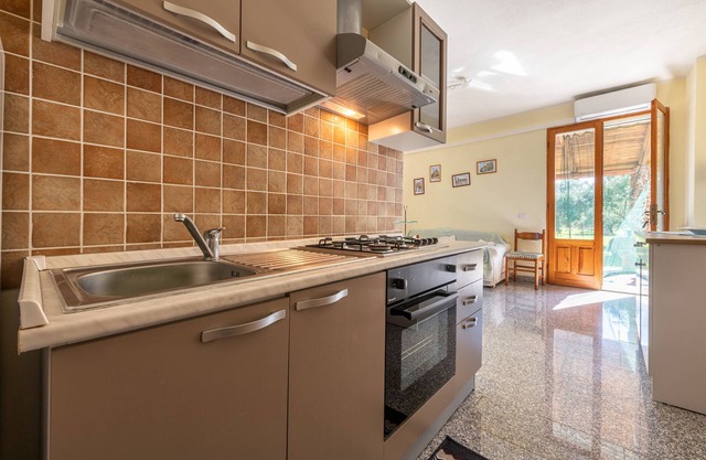 Ferienhaus 'Villetta Immersa Nella Natura' mit Meerblick, Garten und Klimaanlage