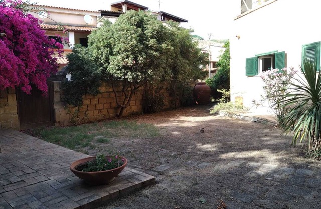 Holiday Home with Garden in front of the pine forest and the beach!