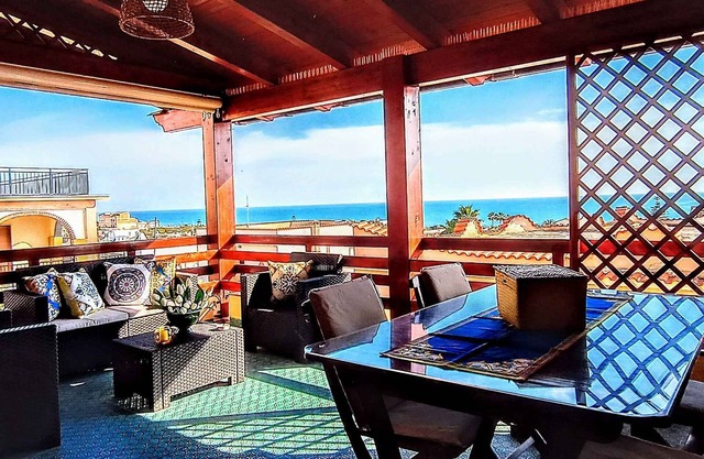 Ferienhaus mit Terrasse mit Meerblick, Klimaanlage, großem Küchenbereich, Grill und WI-FI!