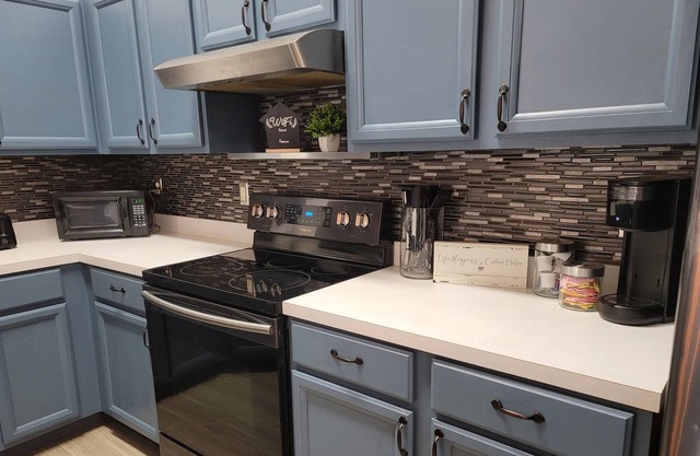 Home away from home!! Spacious 4 bedroom home!! With a fenced-in backyard!!!!!