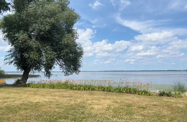Home with panoramic lake views of Lake Poygan