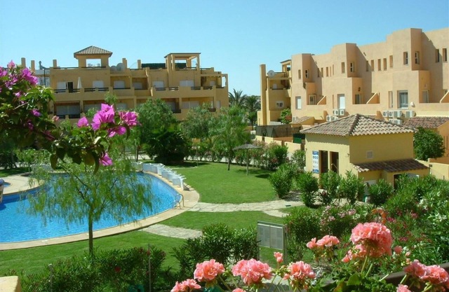"Homely Apartment in El Faro" in El Faro mit Pool, Terrasse, Balkon, Klimaanlage und WLAN