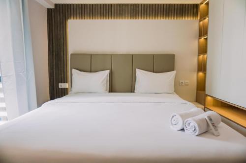 Homey and Spacious 3BR at Sky House BSD Apartment By Travelio