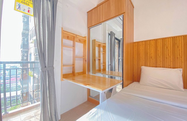 Homey & Restful Studio At Tamansari Panoramic Apartment