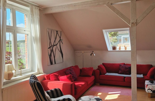 Haus Elbgold. Ferienwohnung mit großer Wohnküche direkt an der Elbe.