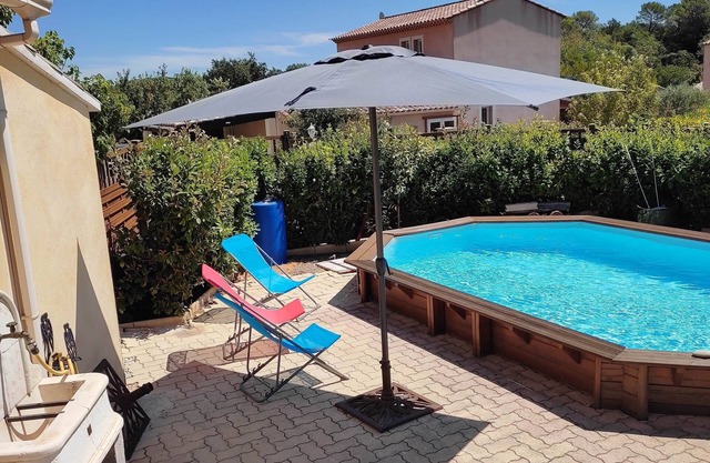 House in quiet subdivision, with swimming pool.