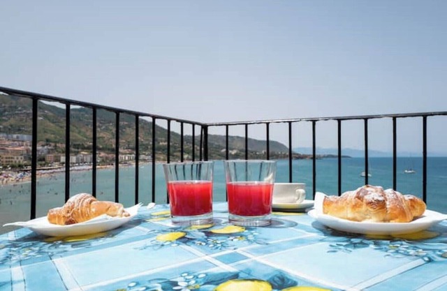 House on the sea and medieval wash house in Cefalù