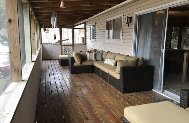 House overlooks Lake Sequoyah with public access to the lake and close to Beach